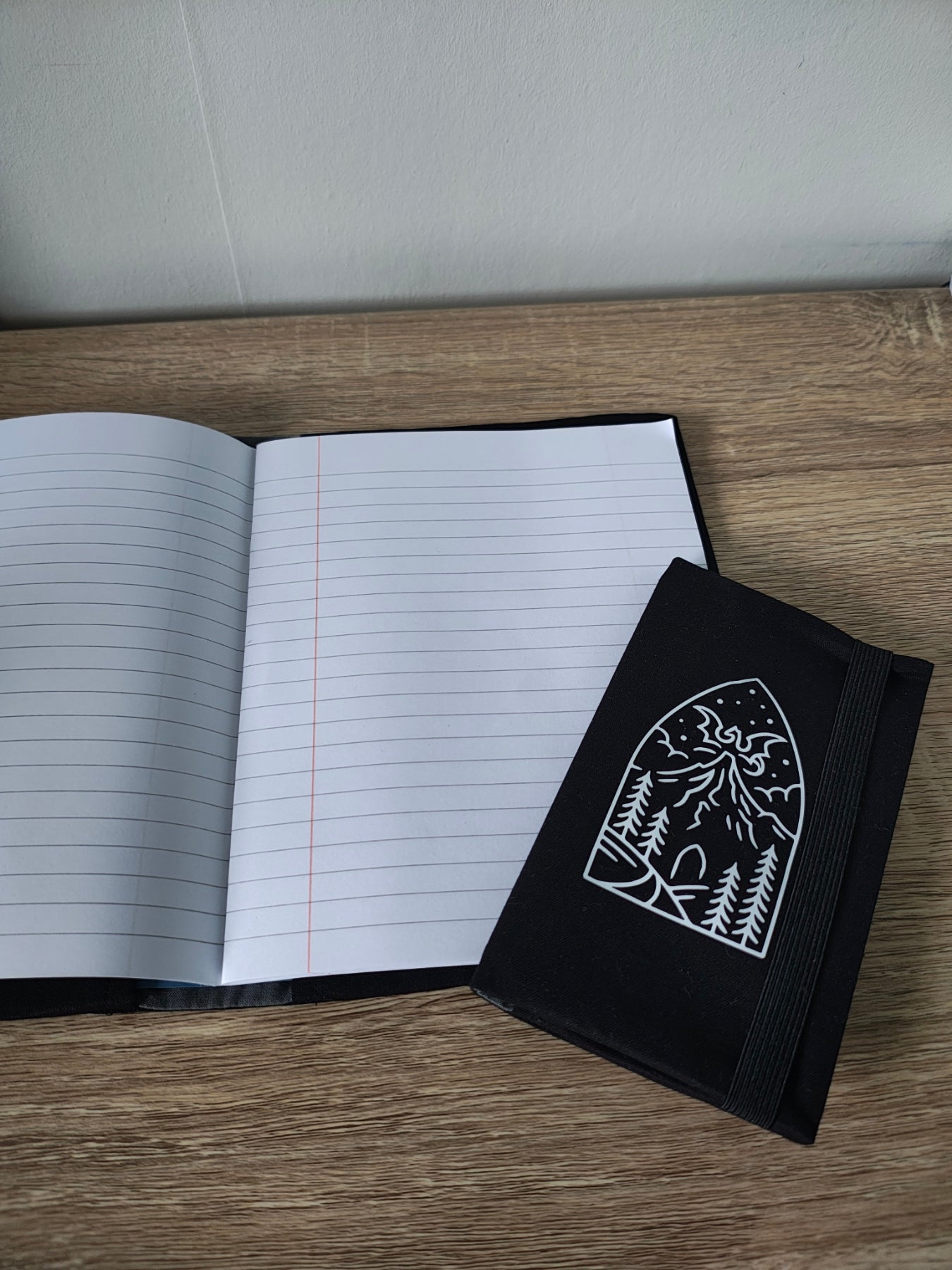 A5 an Travelers note book with Dragon Mountain design on the cover