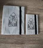 Dragon mountain cream note book covers  on a wooden surface